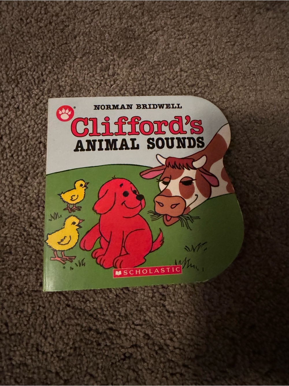 Scholastic Clifford's Animal Sounds Board Book - Red, Green, Yellow, Brown